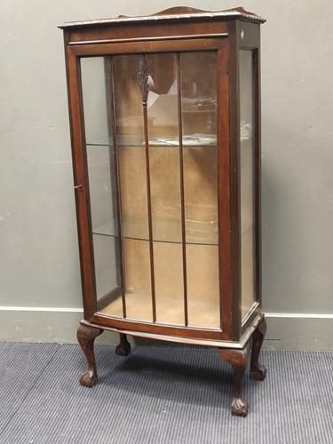 Lot 534 - A glazed door bowfronted display cabinet on...