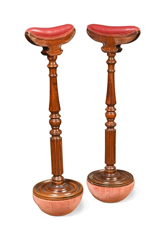 Lot 434 - A late Victorian pair of mahogany 'drunken' crutches