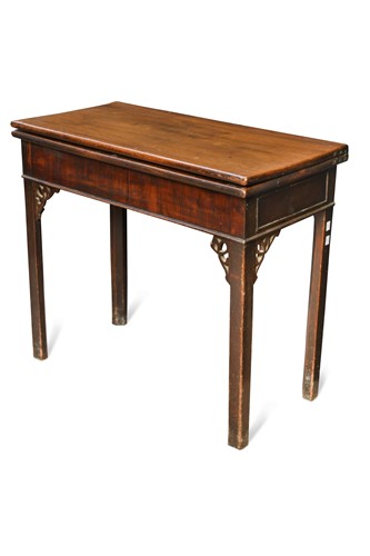 Lot 499 - A George III mahogany fold over tea table