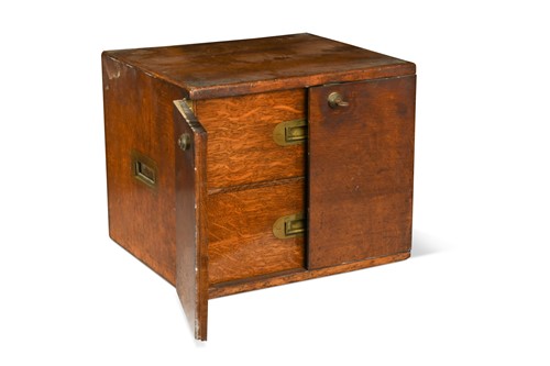 Lot 631 - An oak humidor, early 20th century