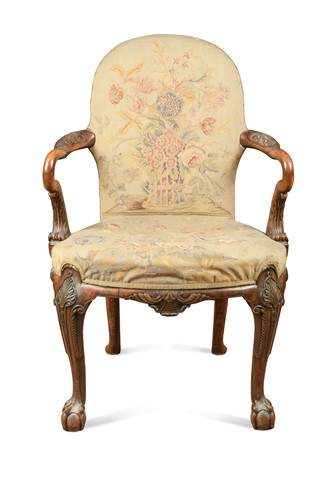 Lot 549 - A George II style walnut elbow chair