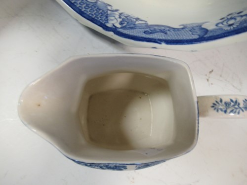 Lot 21 - A Mason's blue and white willow pattern wash...