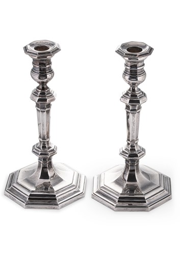 Lot 678 - A pair of mid 20th century silver candlesticks