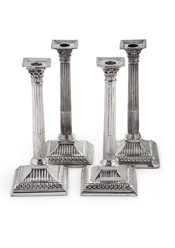 Lot 525 - A harlequin set of 4 George II silver candlesticks