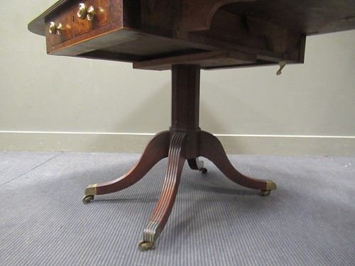 Lot 469 - A Regency mahogany and ebony line inlaid Pembroke table