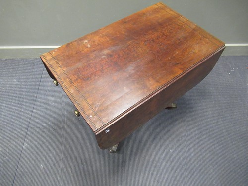 Lot 469 - A Regency mahogany and ebony line inlaid Pembroke table