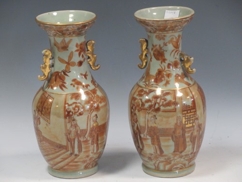 Lot 99 - A pair of Chinese rouge de fer two handled...