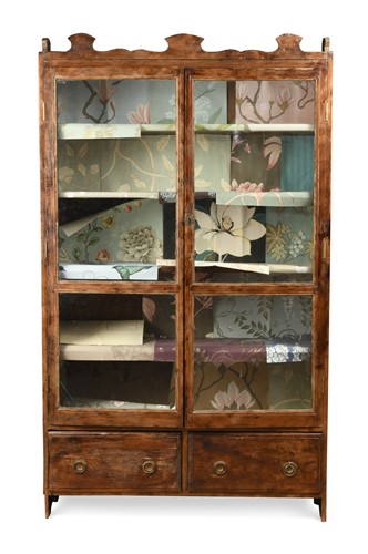 Lot 641 - A stained pine two-door glazed cabinet, early 20th century