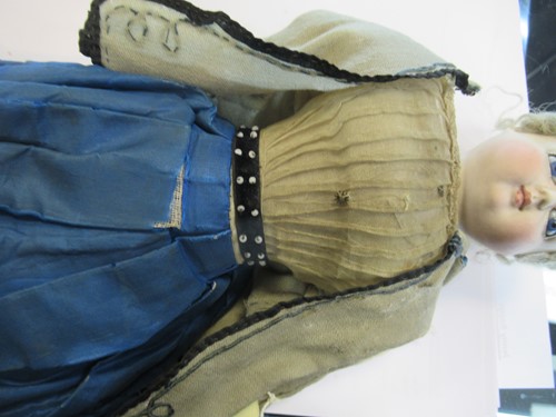 Lot 38 - A Victorian porcelain head doll, with blond...