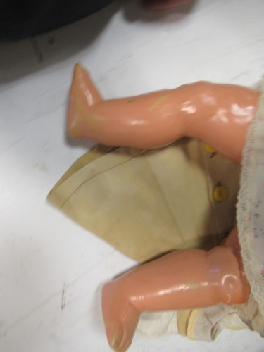 Lot 20 - A teddy bear, felt head doll, stuffed toy...