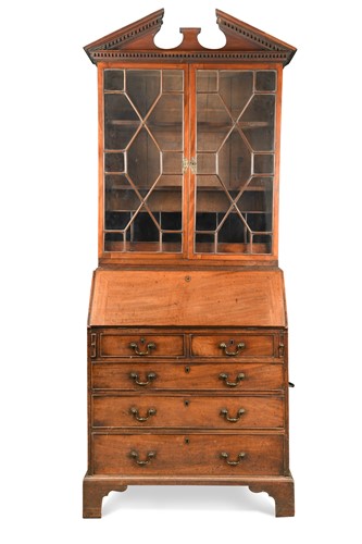 Lot 404 - A George III mahogany bureau bookcase