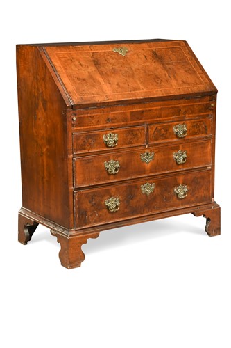 Lot 377 - A walnut and feather banded bureau, 18th century
