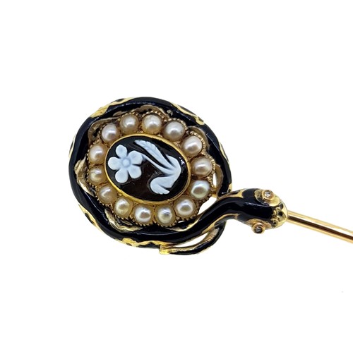 Lot 80 - An enamelled mourning stick pin, together with a cameo stick pin