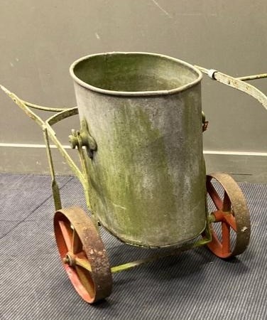 Lot 698A - A galvanised water bowser on cast iron carriage