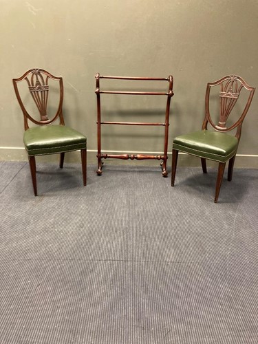 Lot 570 - A pair of Hepplewhite style mahogany dining...