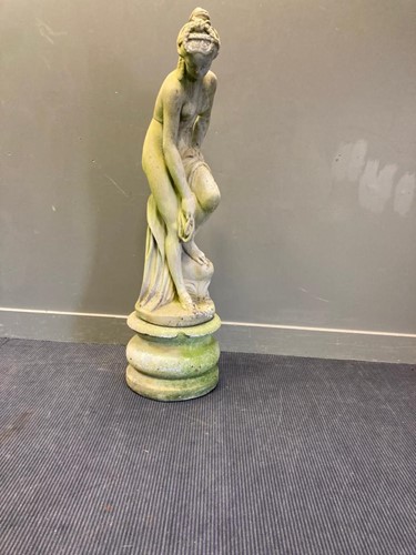 Lot 696 - A reconstituted stone garden statue of Venus,...