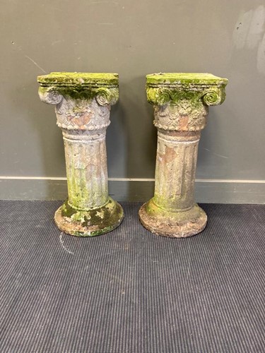 Lot 704 - A pair of terracotta garden columns, each app....