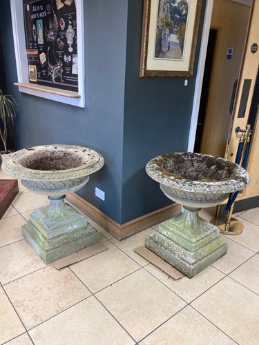 Lot 695 - A pair of Haddonstone trellis pattern garden...