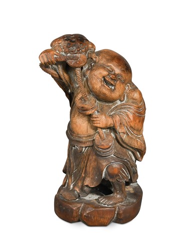 Lot 160 - A Chinese bamboo carving of Liu Hai and the greedy toad, Qing Dynasty, 19th century