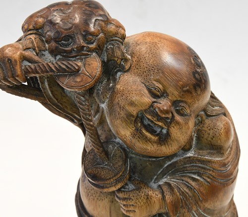 Lot 160 - A Chinese bamboo carving of Liu Hai and the greedy toad, Qing Dynasty, 19th century