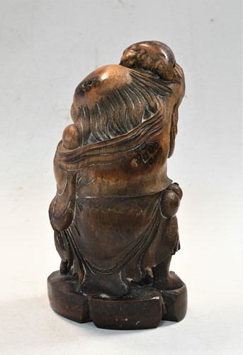 Lot 160 - A Chinese bamboo carving of Liu Hai and the greedy toad, Qing Dynasty, 19th century