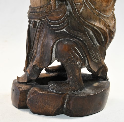 Lot 160 - A Chinese bamboo carving of Liu Hai and the greedy toad, Qing Dynasty, 19th century
