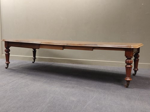 Lot 642 - A 19th century mahogany extending dining table...