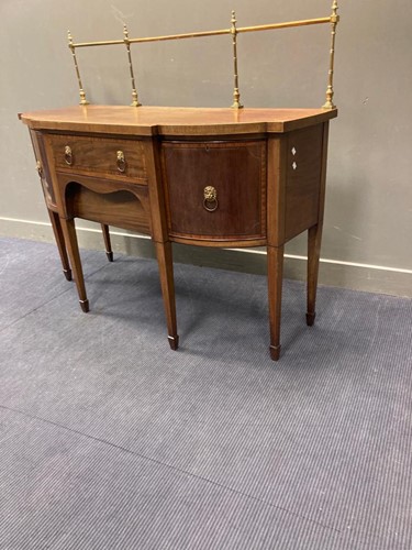 Lot 501 - A George III crossbanded mahogany sideboard...