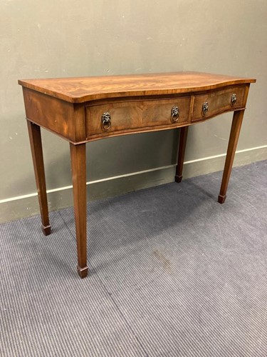 Lot 643 - A George III style mahogany serpentine serving...