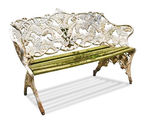 Lot 669 - A Coalbrookdale style white painted cast iron garden bench, late 19th century