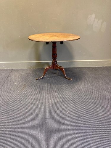 Lot 491 - A George III mahogany tilt-top tripod table,...