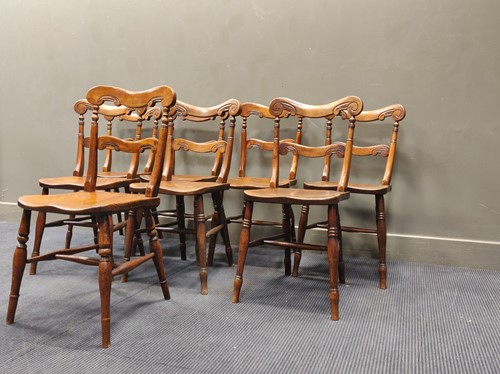 Lot 559 - A matched set of early 19th provincial elm...