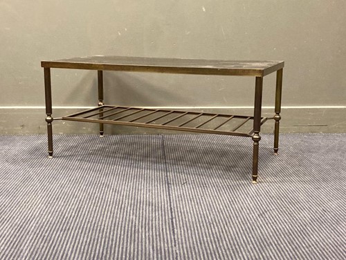 Lot 512 - A modern brass coffee table with inset glass...