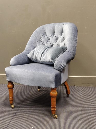 Lot 672 - A small Victorian nursing chair upholstered in...