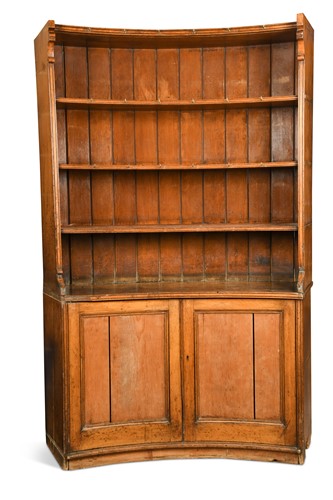 Lot 392 - A blonde oak curved dresser, circa 1900