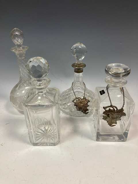 Lot 24 - Four glass decanters, two with cut and...