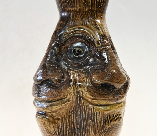 Lot 50 - Robert Wallace Martin for Martin Brothers, a salt glazed stoneware vase, 1884
