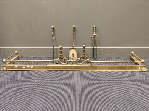 Lot 546 - An adjustable brass fender, 162 x 38cm,...