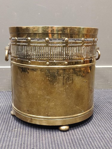 Lot 599 - A brass coal bucket with pierced sides, 35.5cm...