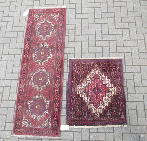 Lot 725 - A Persian hallway runner 205 x 63cm together...