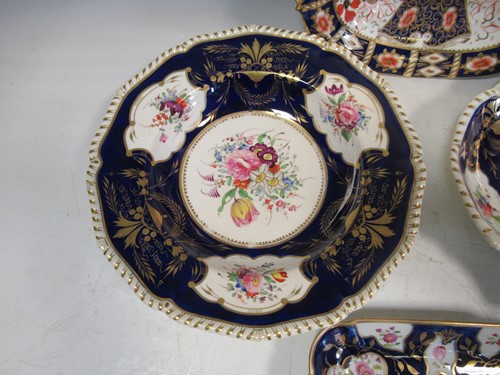 Lot 2 - Four Derby and Davenport plates decorated with...