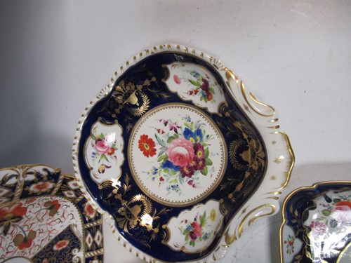 Lot 2 - Four Derby and Davenport plates decorated with...