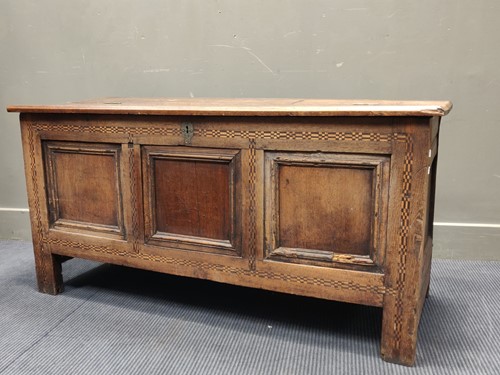 Lot 566 - A 17th century inlaid oak coffer 63 x 127 x 50cm