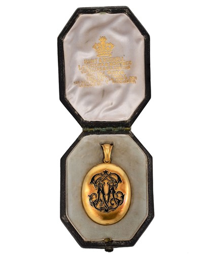 Lot 89 - An enamelled memorial locket
