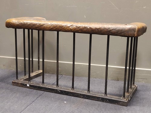 Lot 619 - A black painted leather upholstered club...