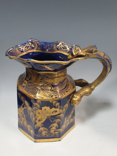 Lot 126 - A collection of various ceramic jugs to...