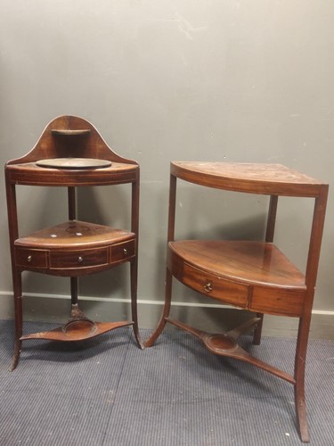 Lot 485 - Two George III mahogany corner washstands,...