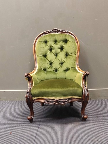 Lot 519 - A Victorian walnut button back chair...