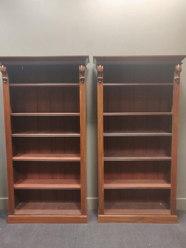 Lot 638 - A pair of mahogany bookcases with adjustable...