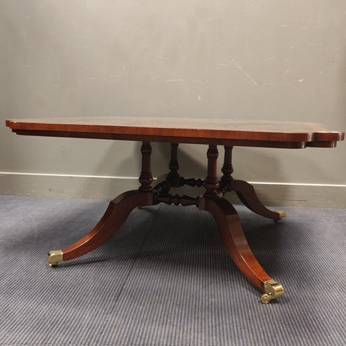 Lot 529 - A large modern mahogany coffee table 51 x 107...